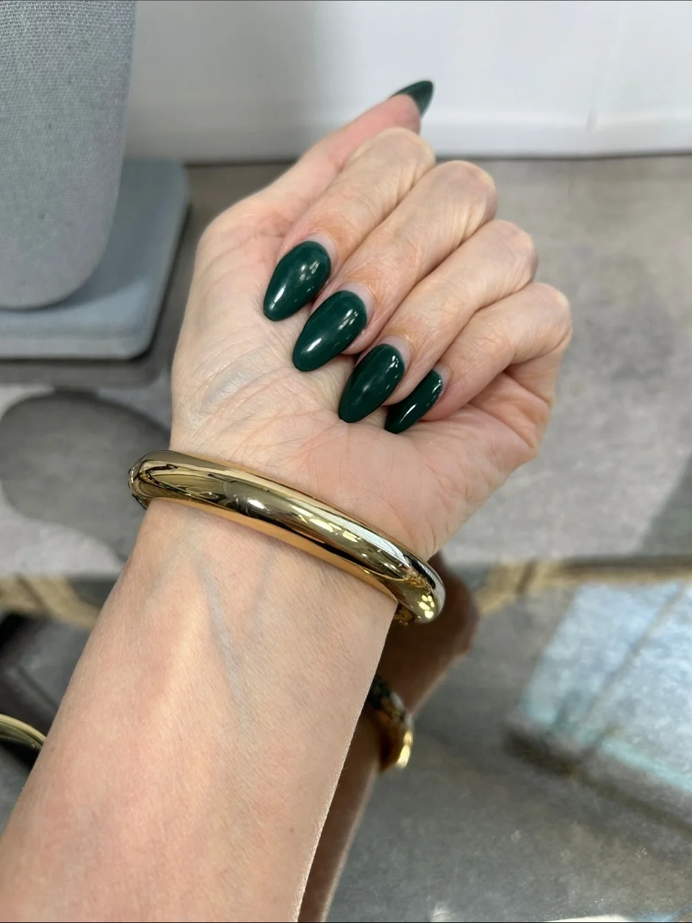 Gold Bangle Bracelet with Emerald Green Crystals